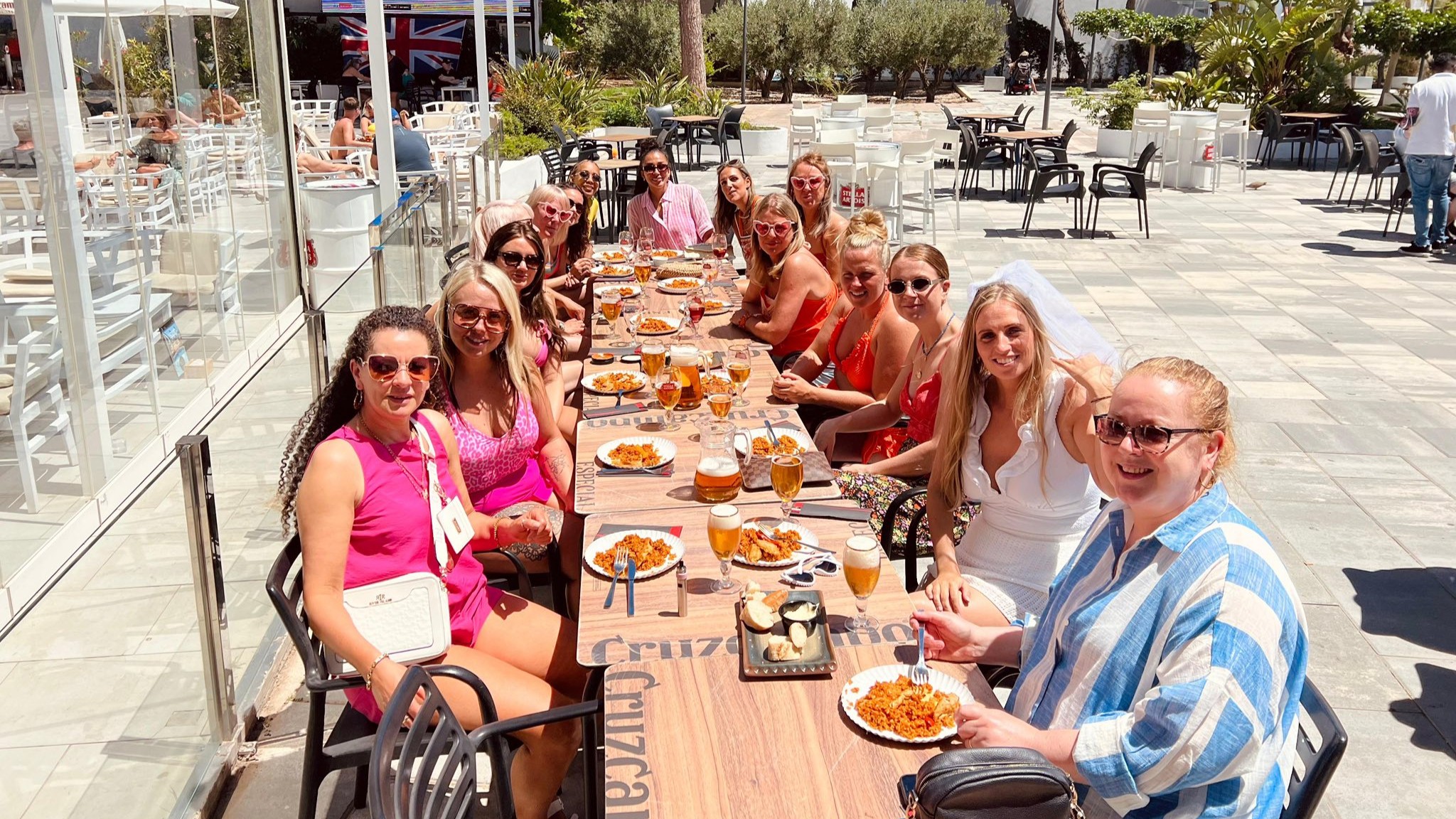 group of people eating paella 